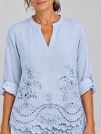 Nora top, close up of embroidery and neckline