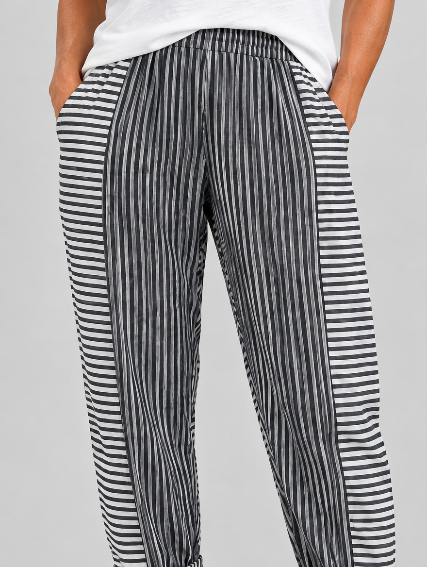 Dahlia relaxed fit trousers in black stripe, close up of waistband, side panels and fabric