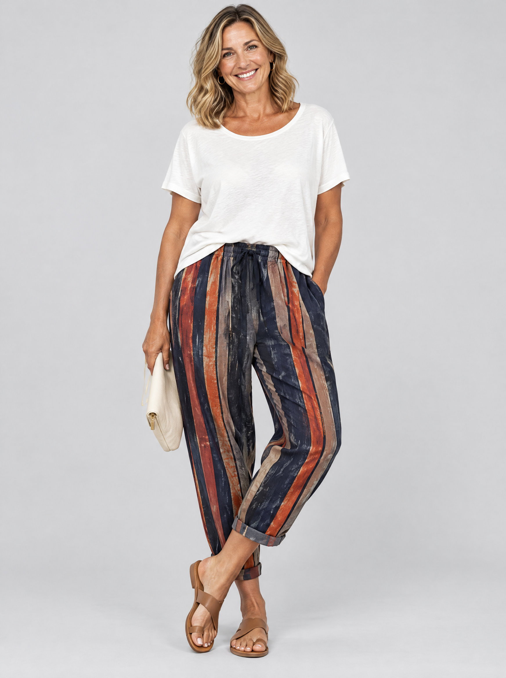 Paulina cotton linen trousers in navy, rust and taupe stripe, front view