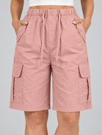 Leanna cargo shorts in dusty pink, close up of drawstring waistband and cargo pockets