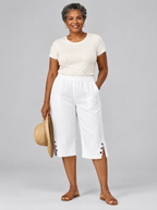 Laurel lightweight comfort shorts in white with button side slits, front view