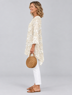 Violet top in beige, side view