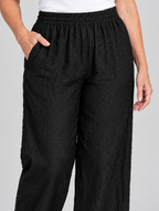 Karina linen pants, black pair from the pack of 5, close up of waistband and fabric
