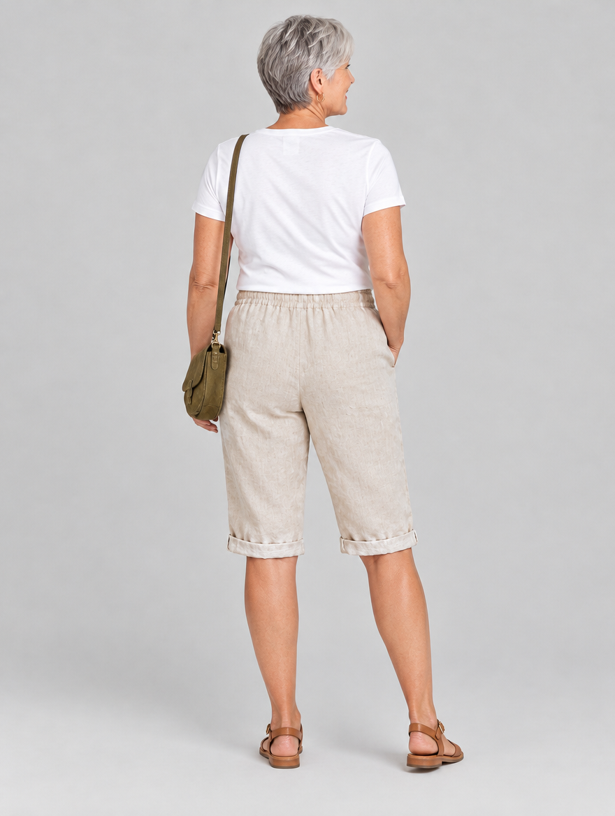 Isla linen shorts in beige, back view
