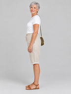 Isla linen shorts in beige, side view