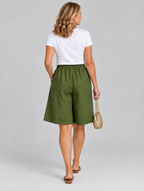 Sabby linen shorts in army green, back view