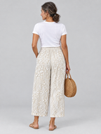 Eleanor vine printed trousers in beige, back view