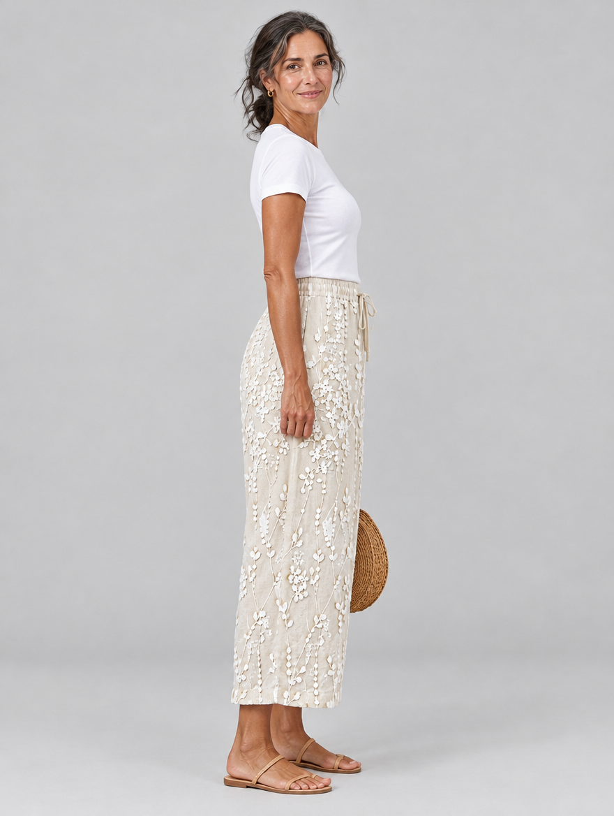 Eleanor vine printed trousers in beige, side view