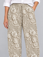 Hazel printed pants in khaki, close up of waistband and fabric