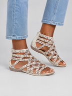 Olesya sandals in light leopard print, worn with light blue straight leg jeans