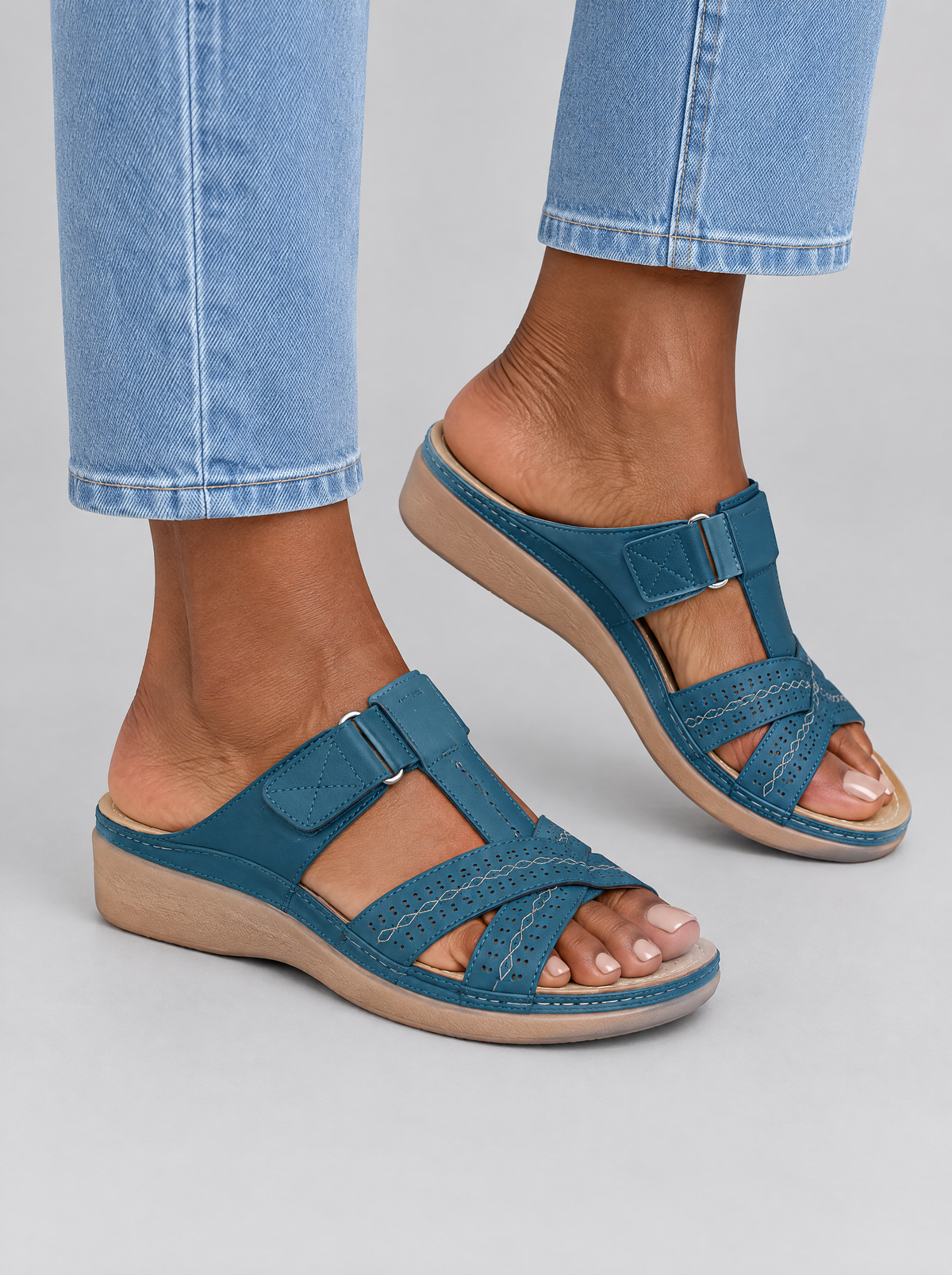 Toby sandals in blue, worn with light blue straight leg jeans