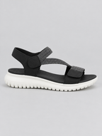 Finley sandals in black, side view
