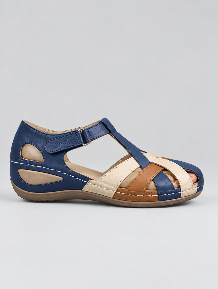 The Ortho Moden sandals in blue, side view