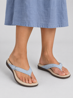 Daryl sandals in sky blue, worn with a dusty blue linen midi skirt