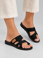Liliane sandals in black, worn with cream linen culottes