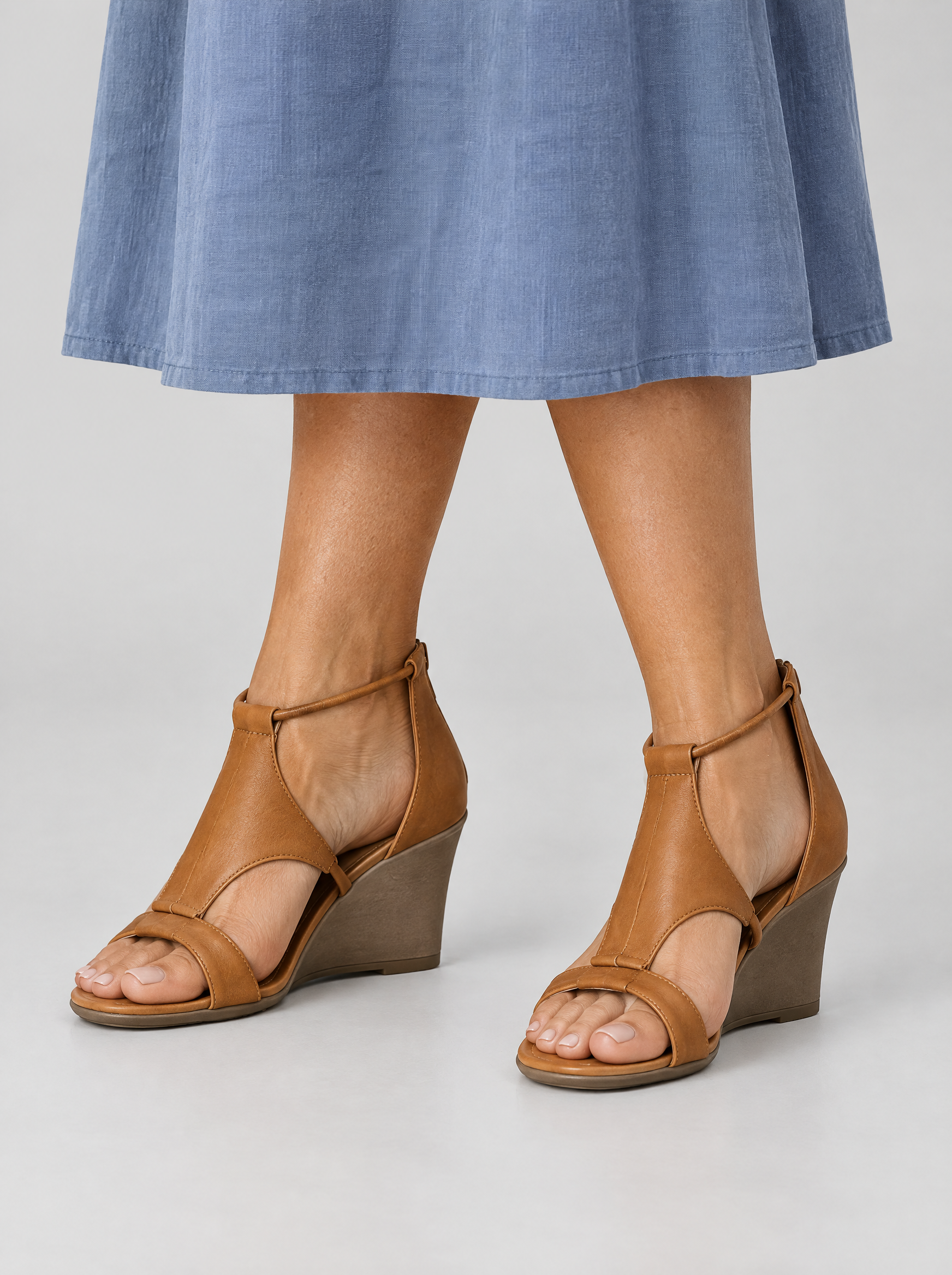 Leila sandals in brown, worn with a dusty blue linen midi skirt